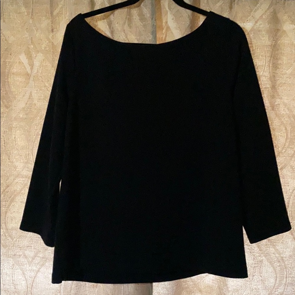 Black wide neck blouse. Zipper detail on back.